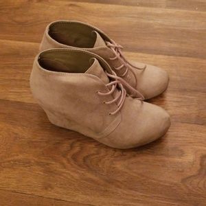 Tan wedge booties.
